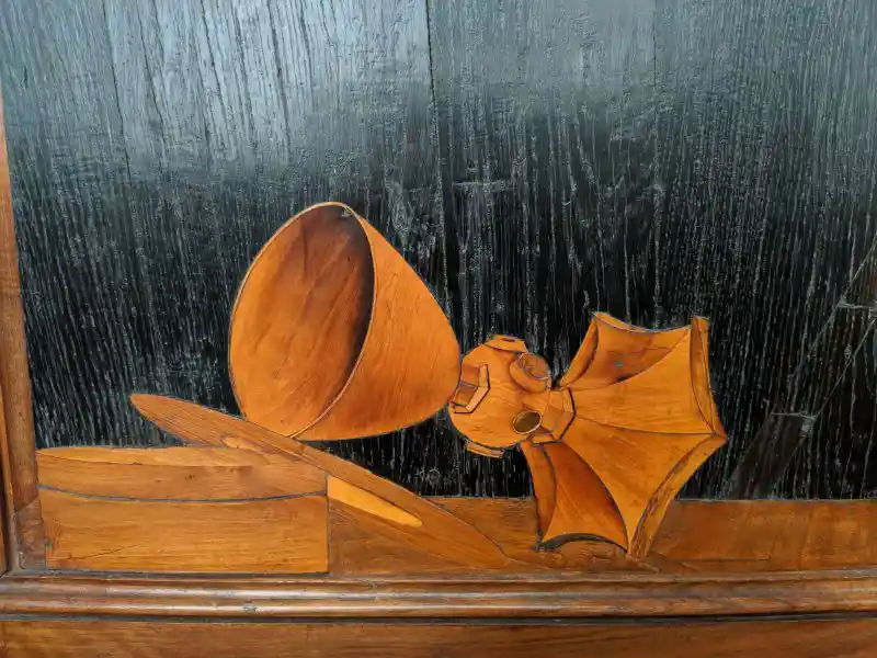 Detail of a choir stalls, wooden chalice with six-point base, located in Bode Museum.